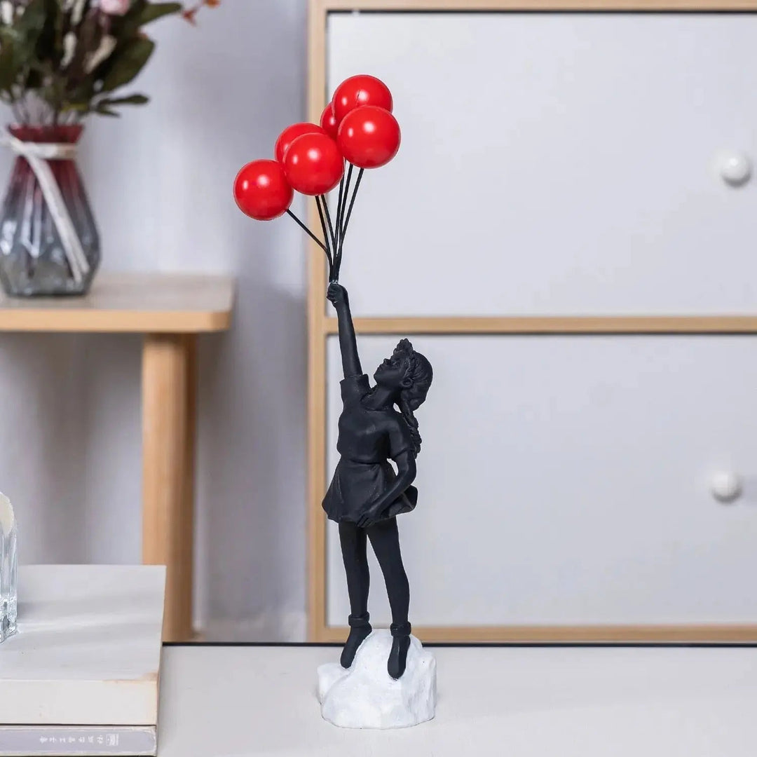 Banksy - Statua „Latająca Dziewczynka z Balonem”
