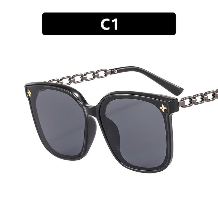 Damskie oversize okulary przeciwsłoneczne z modnym detalem łańcucha Karnz