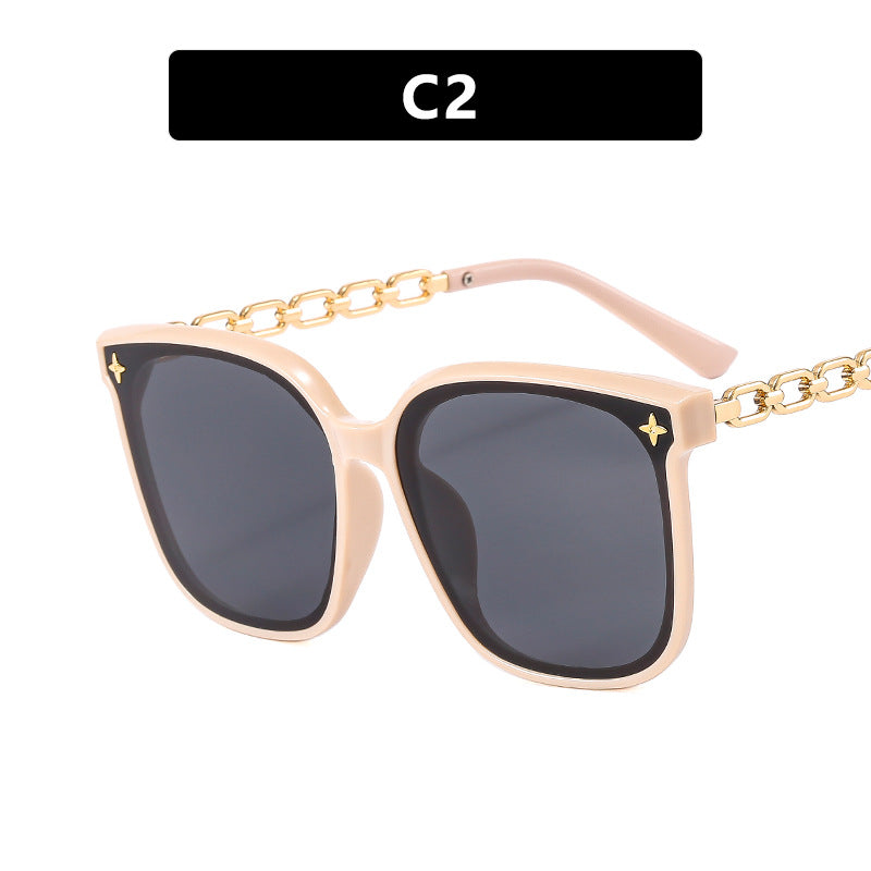 Damskie oversize okulary przeciwsłoneczne z modnym detalem łańcucha Karnz