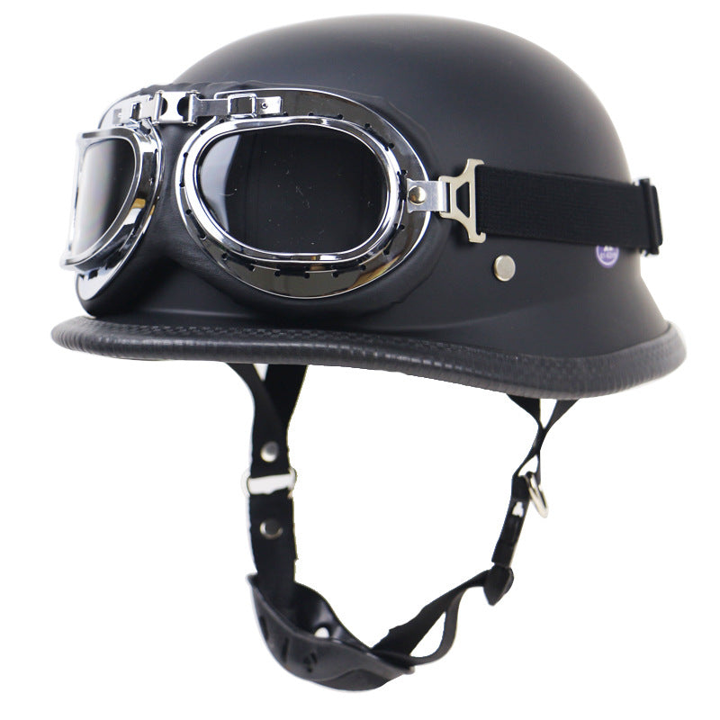 Vintage kask motocyklowy z ochronnymi goglami Karnz