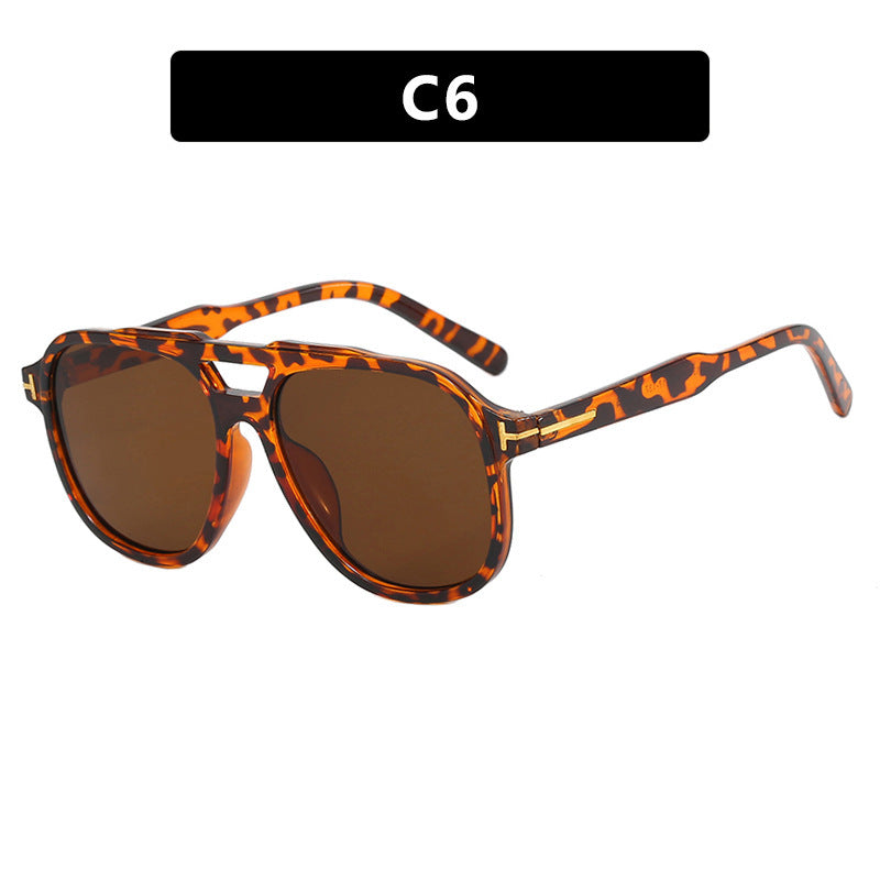 Damskie stylowe okulary przeciwsłoneczne w nowoczesnym designie z unikalną ramką Karnz